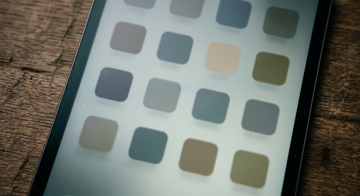 a close crop of an app-store-style grid of blank rounded squares on a tablet