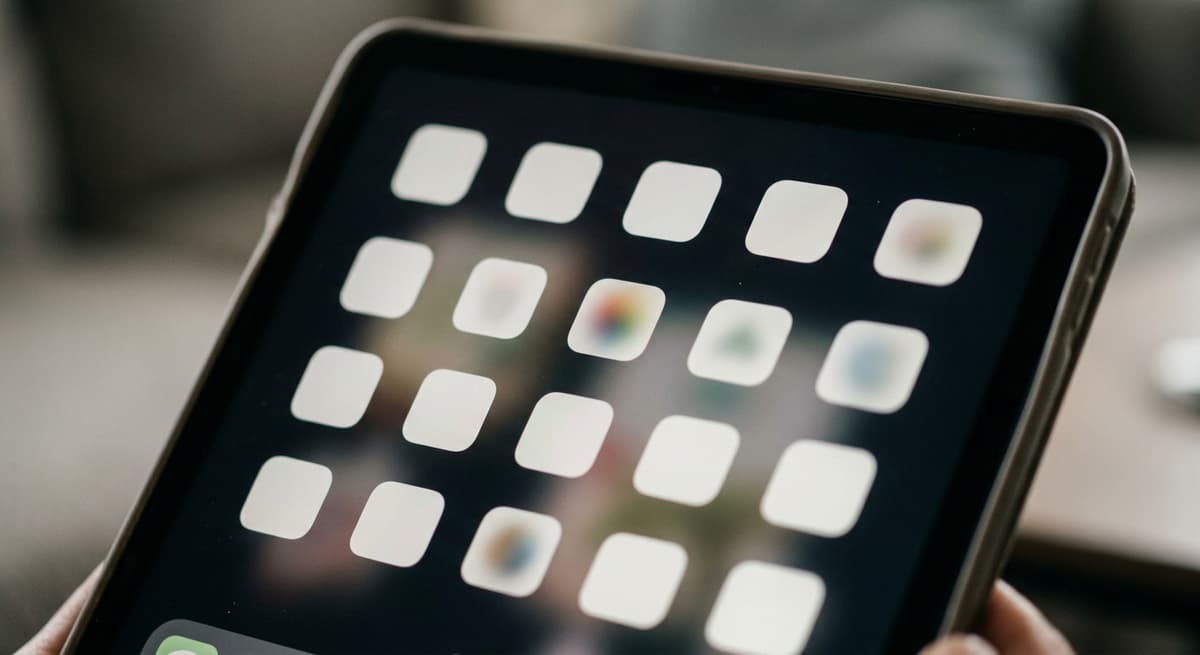 a close crop of an app-store-style grid of blank rounded squares on a tablet