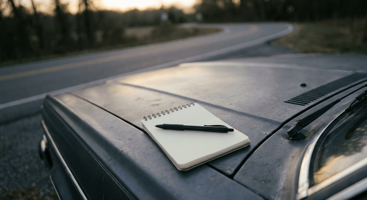 Alberta police badge and notepad on a desk surface