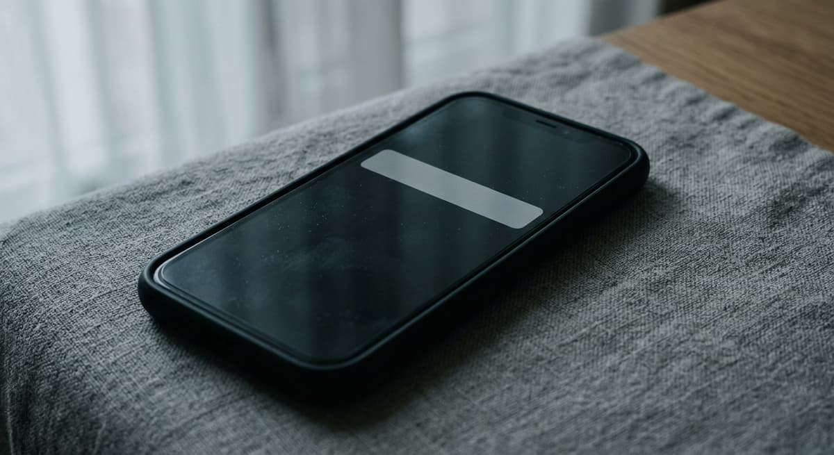 a close crop of a phone showing a blank notification banner shape